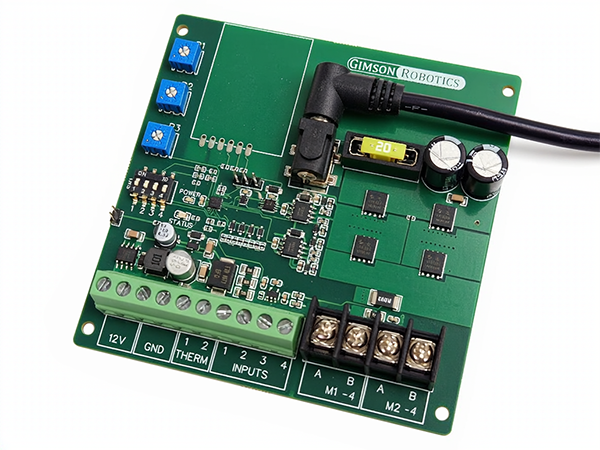 Motor controller circuit board with a radio receiver and hand-held remote